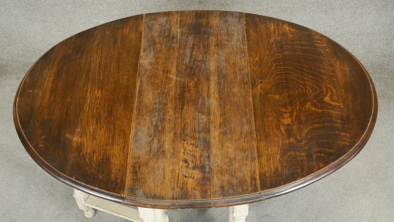 A mid century oak drop flap dining table on distressed painted gateleg barleytwist supports. H.72 - Image 3 of 5