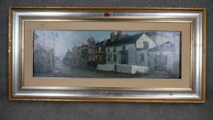 A framed oil on board of St Margarets Street, Rochester. Indisticntly signed and dated. H.30 W.50cm