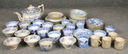 A large collection of early 20th century blue and white china with Oriental design and blue willow