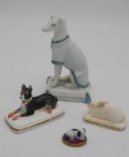 A collection of 19th century porcelain animals. Including a Chelsea style King Charles spaniel on