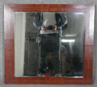 A late 19th century Continental wall mirror in mahogany and satinwood strung frame. H.74 W.81