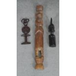 Three carved wooden tribal figures, two possibly fertility figures. H.75cm