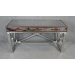 An Andrew Martin style mirrored and leather travel trunk style bound console table on brushed