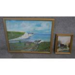 Two framed oils on board landscapes (one glazed). One of a cliff seascape signed Wright and a
