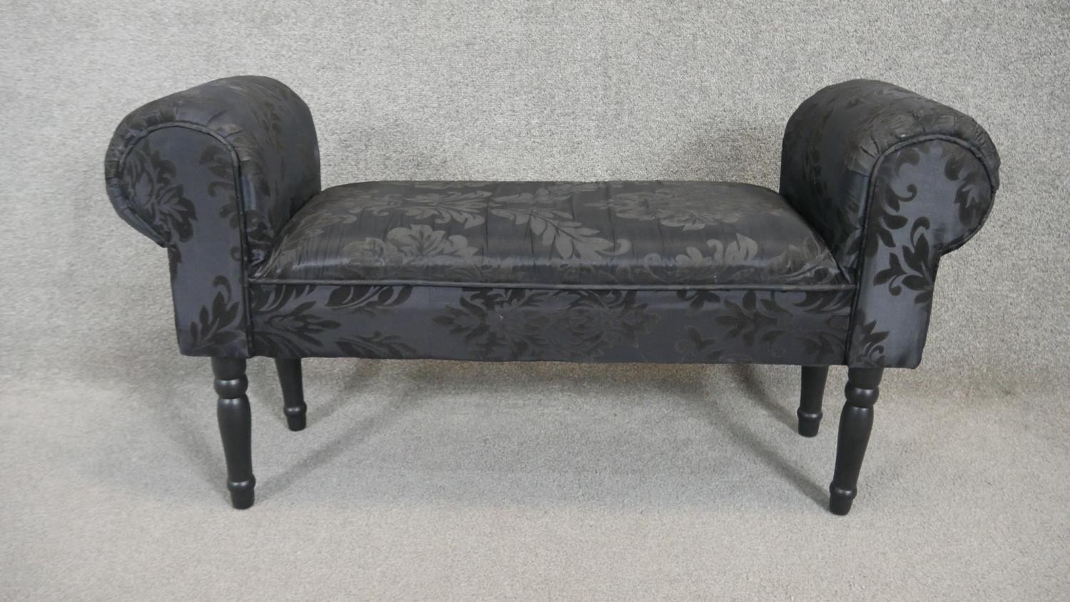 A contemporary upholstered scroll end window seat. H.55 W.100 D.30cm