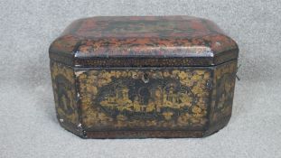 A 19th century lockable Chinese gilded lacquer tea box with engraved pewter lidded partitions.