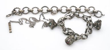 A collection of white metal jewellery. Including an Indian charm bracelet, a contemporary silver