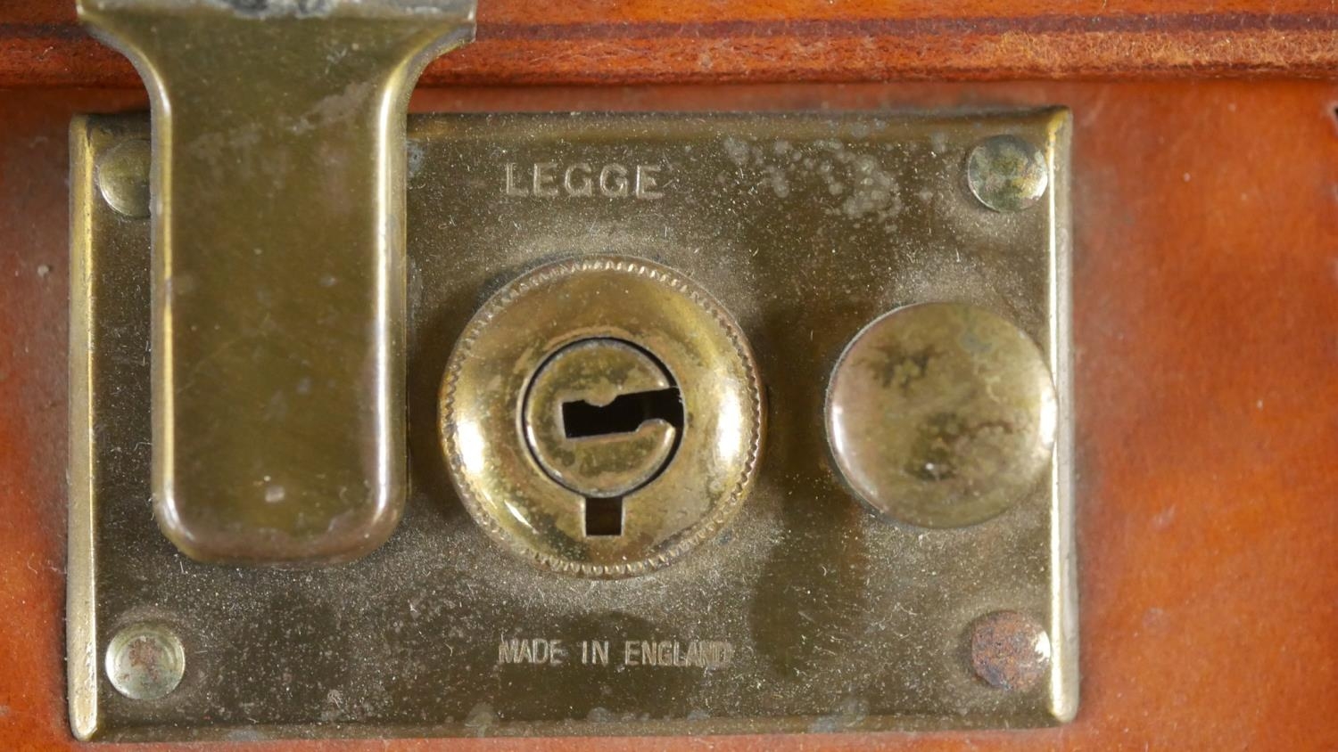 Two antique tan leather suitcases with brass fittings. One filled with curiosities from around the - Image 3 of 6