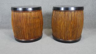 A pair of contemporary lamp tables with ebonised tops and bamboo sides. H.57 W.50cm