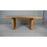 A contemporary hardwood planked top table on block supports. H.75 W.180 D.110cm (supports