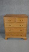 A Victorian style pine chest of drawers. H.100 W.90 D.46cm