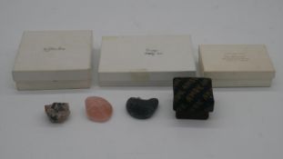 A collection of mineral samples. Including Obsidian, picture marble, soapstone, rose quartz.