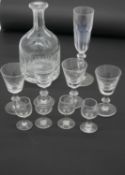 A collection of antique glassware. Including a Victorian cut glass decanter with engraved name, five