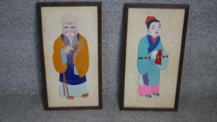 Two framed and glazed Chinese silk stump work collages of immortals with hand painted details. H.