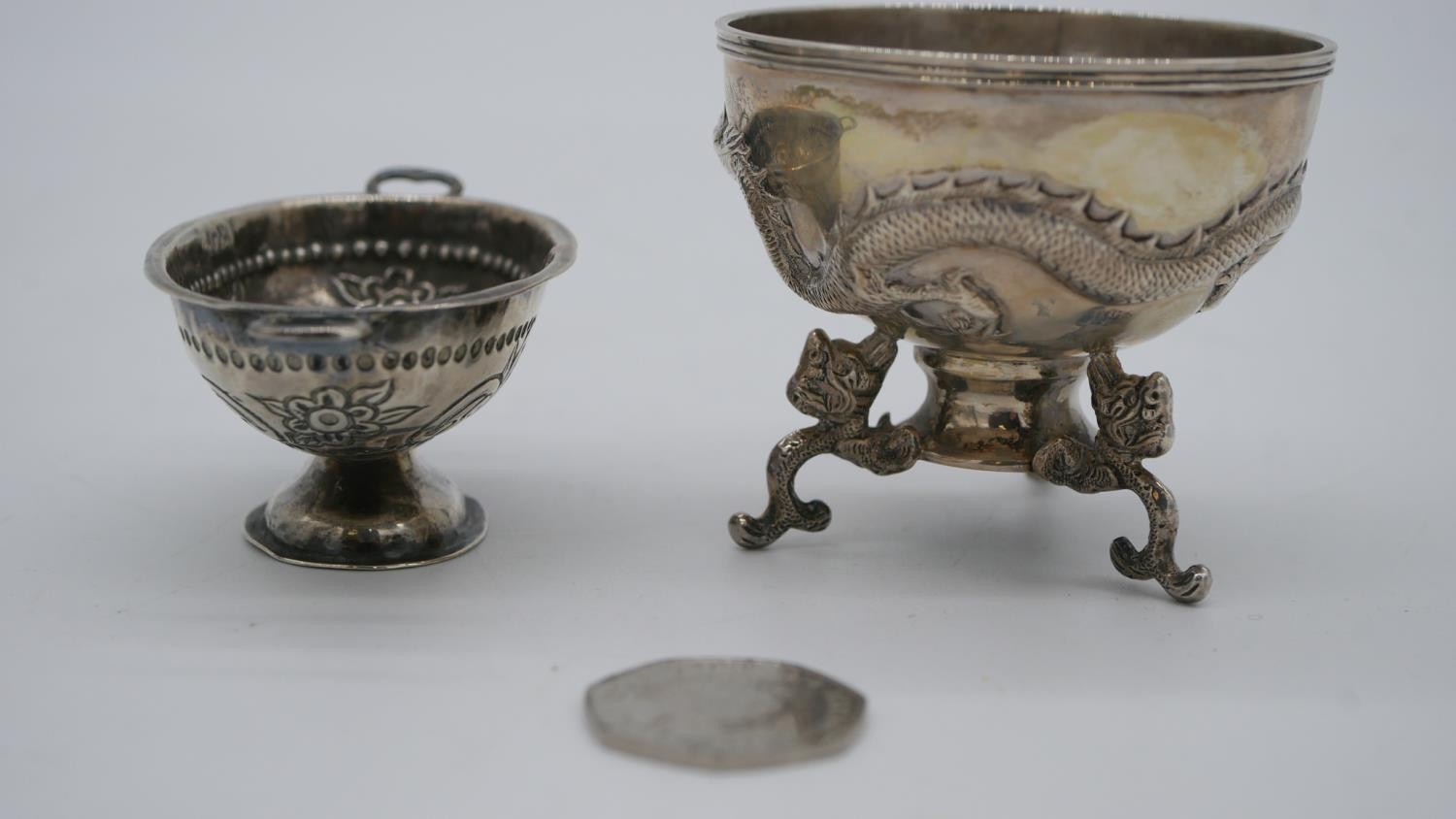Two Chinese silver bowls. One by Wah Hing a repousse dragon design bowl on a triple dragon head form - Image 2 of 6