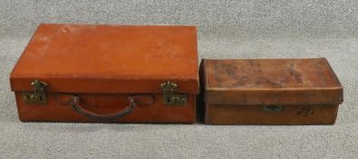 Two antique tan leather suitcases with brass fittings. One filled with curiosities from around the