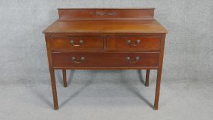 An Edwardian mahogany two drawer chest. H.94 W.107 D.53cm
