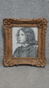 A 20th Century gilt framed and glazed print of a charcoal study, profile of a young lady. H.50 W.