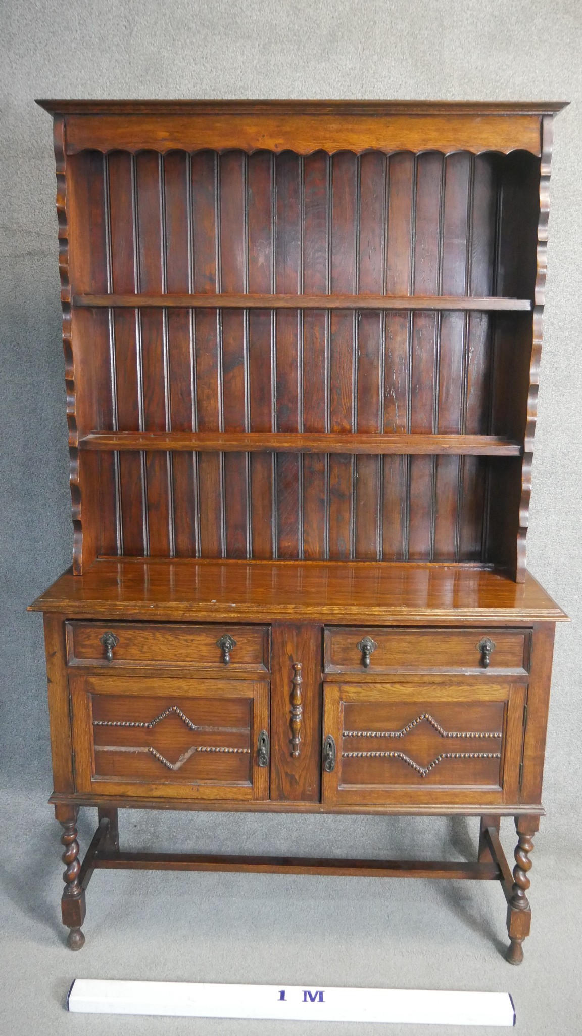 A George V oak dresser and rack, Jacobean style, the rack with three shelves, the base section - Image 2 of 3