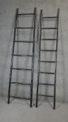 Two contemporary Chinese ebonised bamboo ladders. H.220cm (Largest)