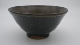 TREVOR CORSER (1938-2015) for Leach Pottery; a stoneware bowl with flared rim, impressed TC and