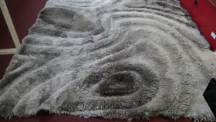 A contemporary sculpted thick pile carpet by Stepevi. 234x234cm