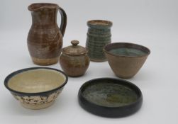 A collection of glazed Studio Pottery. Including a jug, lidded pot and various bowls. Various