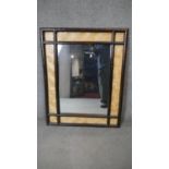 A bamboo framed wall mirror. H.83 W.51cm