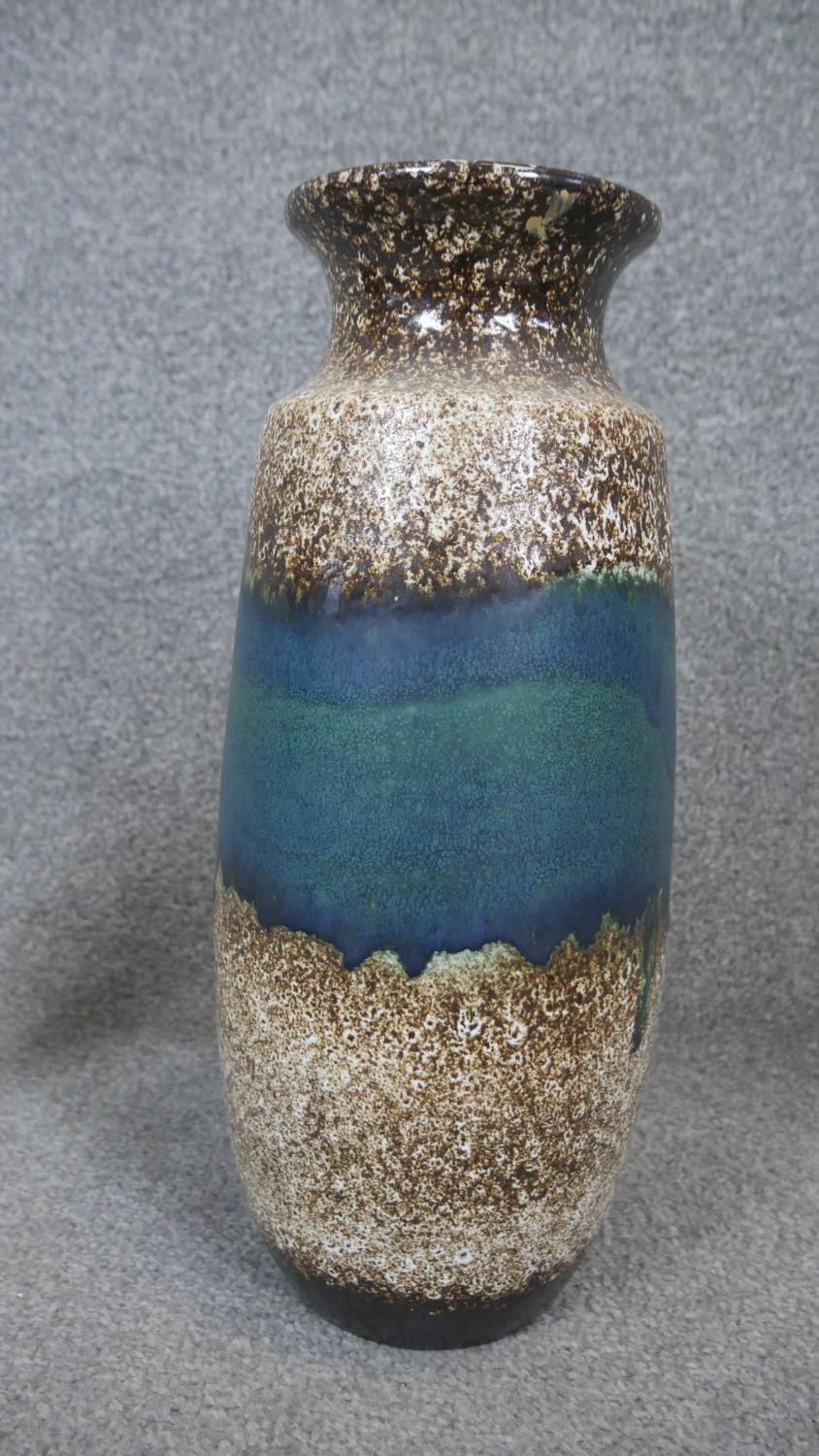 A collection of ceramics and metal ware. Including a Poole pottery multi colour glaze vase, a West - Image 6 of 8