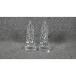 A pair of glass horse head book ends. W.4 H.12 D.8