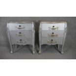 A pair of painted Louis XV style chests on carved cabriole supports. H.77 W.60 D.34cm