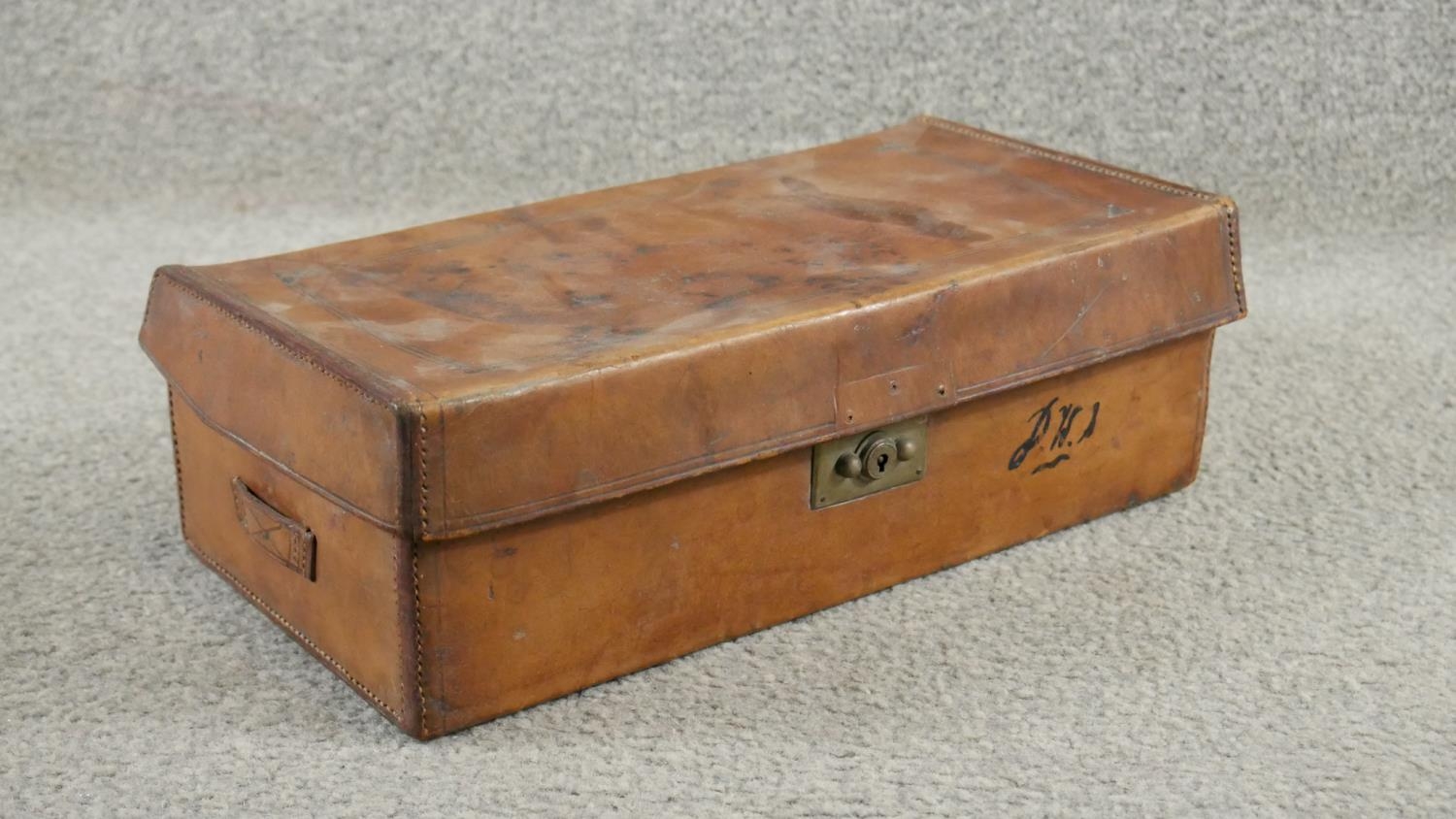 Two antique tan leather suitcases with brass fittings. One filled with curiosities from around the - Image 4 of 6