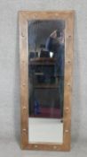 An Eastern dressing mirror in hardwood studded frame. H.123 W.46cm