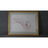 A framed and glazed pencil drawing, nude study, indistinctly signed. W.21 H.57
