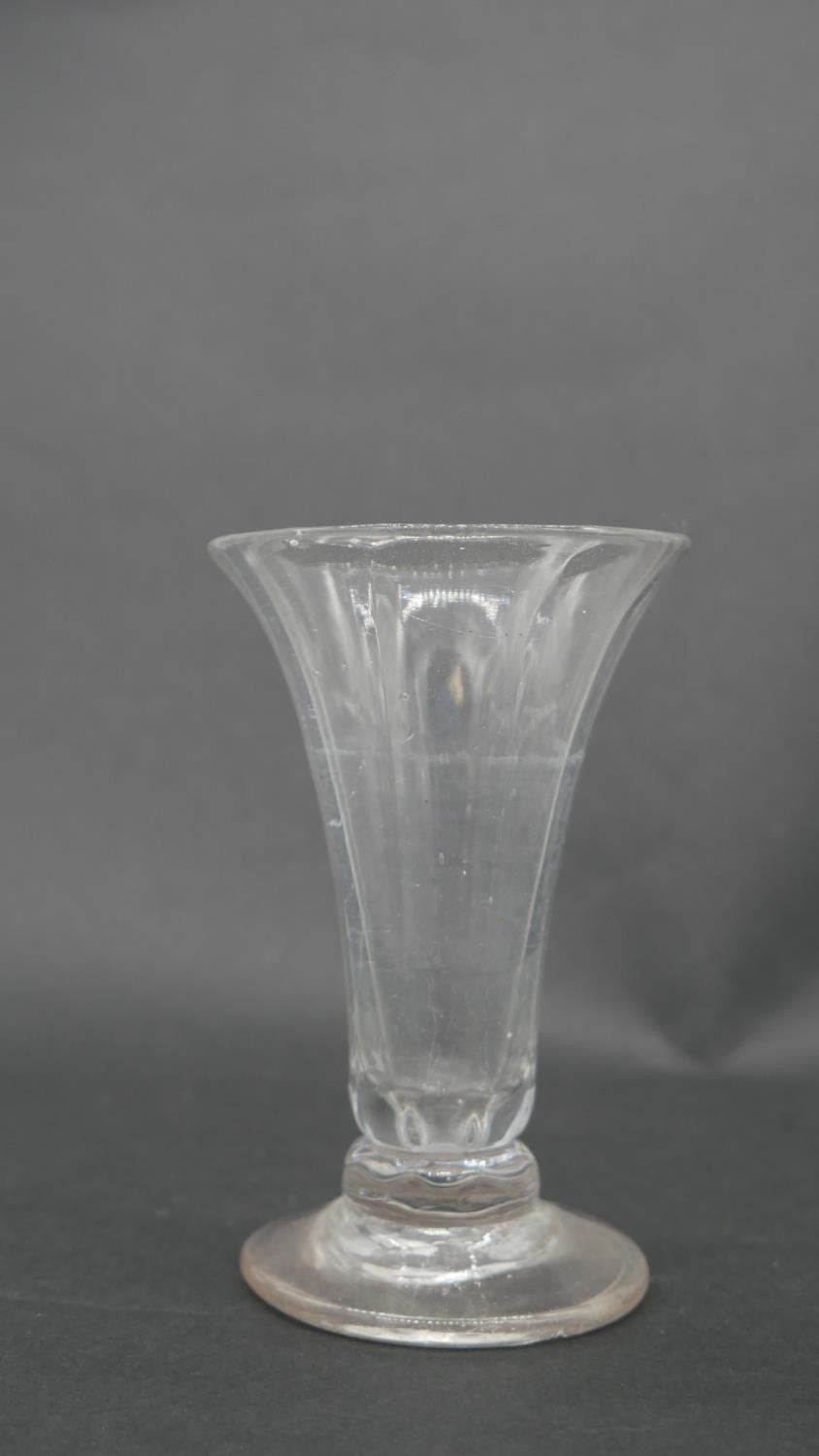 A hand blown Georgian drinking glass.