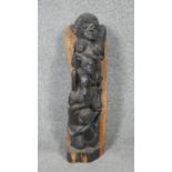 A carved hardwood African totem figure.