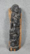 A carved hardwood African totem figure.