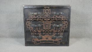 A leather chest with studded decoration and twin carrying handles. H.90 W.100 D.50cm