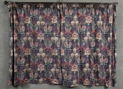 A pair of William Morris style floral and foliate design silk mix lined curtains. H.115 W.150cm