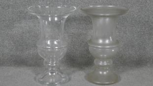 A pair of large glass campana shaped vases