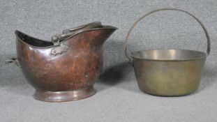A 19th century brass swing handled preserve pan along with a copper coal bucket.