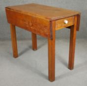 A C.1900 beech drop leaf table. H.76 W.44 W.87 D.90cm