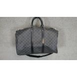 A Louis Vuitton, "Keepall" travel bag 45. Damier Graphite canvas with black leather trims. Date