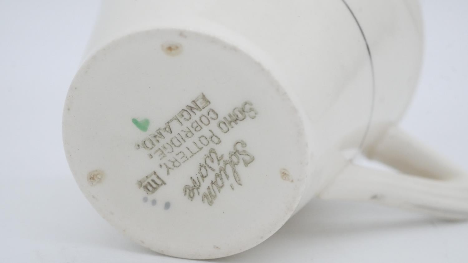 A six person Soho pottery Solian ware green floral pattern coffee set. Maker's mark to the base. - Image 7 of 9