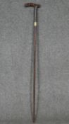 A Briggs and Co coromandel walking cane with 18 carat gold inscribed collar, London hallmarks.