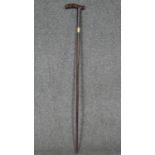 A Briggs and Co coromandel walking cane with 18 carat gold inscribed collar, London hallmarks.