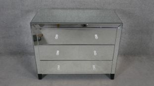 A contemporary mirrored three drawer chest. H.80 W.100 D.50cm