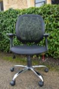 A contemporary office chair with swivel and tilt action on five spoke base. H.95 W.60 D.49cm