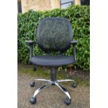 A contemporary office chair with swivel and tilt action on five spoke base. H.95 W.60 D.49cm