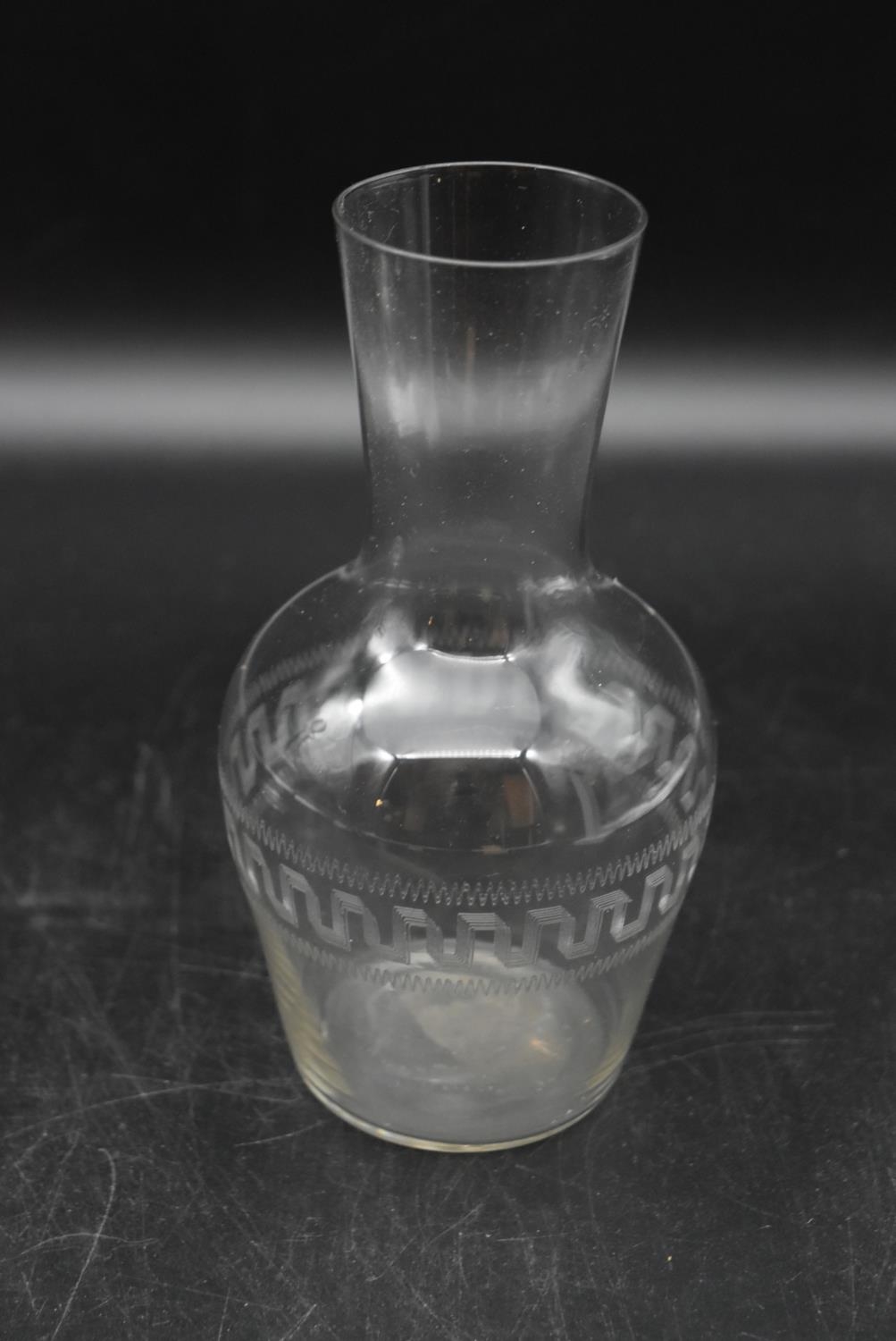 A late Victorian geometrically etched glass decanter with stopper and water carafe. H.30 Dia.14cm ( - Image 6 of 6